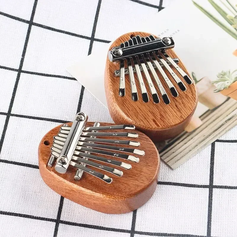 1Pcs Wood Mini Thumb Piano Mus - مراجعة Musical Instrument For Beginners وسعره