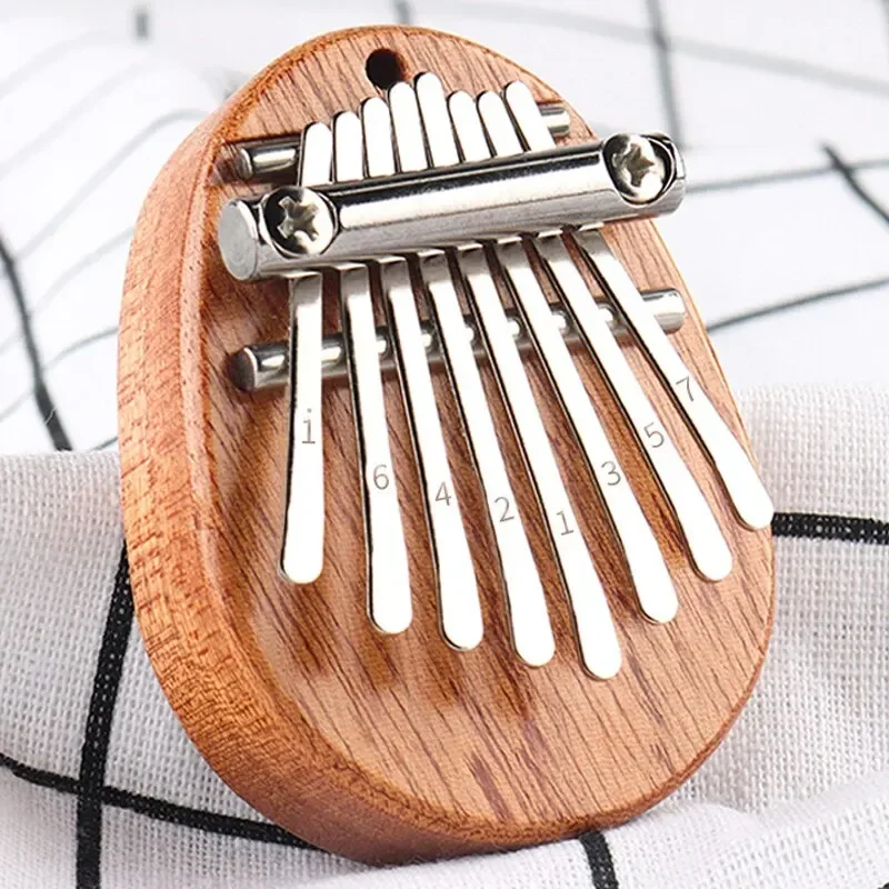 1Pcs Wood Mini Thumb Piano Mus - مراجعة Musical Instrument For Beginners وسعره