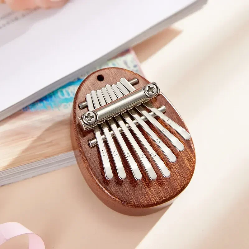 1Pcs Wood Mini Thumb Piano Mus - مراجعة Musical Instrument For Beginners وسعره