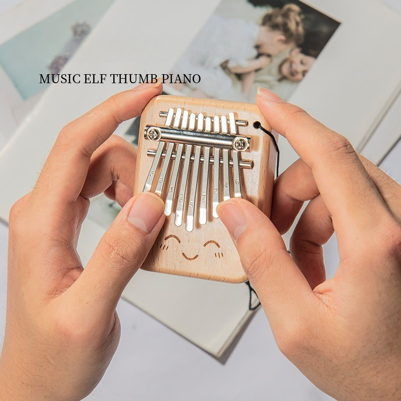 Solid Wood 9-tone Mini Thumb P - مراجعة Musical Instrument For Beginners وسعره